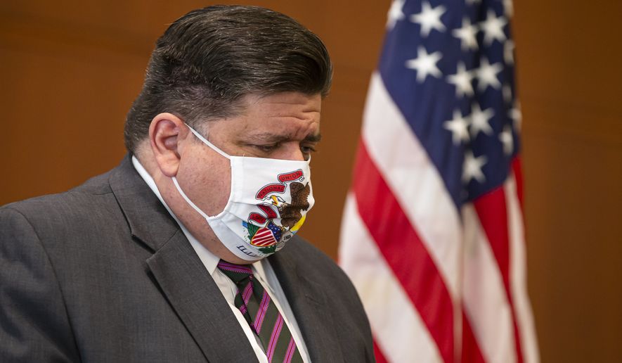 In this Sept. 21, 2020 file photo, Illinois Governor JB Pritzker appears at a news conference in Springfield, Ill. After another record-breaking day in Illinois for new coronavirus infections this weekend, Gov. J.B. Pritzker on Monday, Oct. 26, 2020, again implored residents to do all they can to prevent the spread of COVID-19, the illness caused by the untreatable virus. (Justin L. Fowler/The State Journal-Register via AP File)