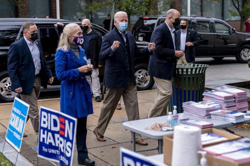 Democratic presidential candidate former Vice President Joe Biden arrives to speak with supporters outside a voter service center, Monday, Oct. 26, 2020, in Chester, Pa. (AP Photo/Andrew Harnik)