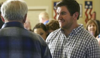 In this May 15, 2018, file photo, Alek Skarlatos, right, speaks at the Douglas County Republican Party headquarters in Roseburg, Ore. Skarlatos, who in 2015 helped thwart an attack by a gunman on a Paris-bound train, faces longtime Democratic U.S. Rep. Peter DeFazio in the November election. (Michael Sullivan/The News-Review via AP, File)