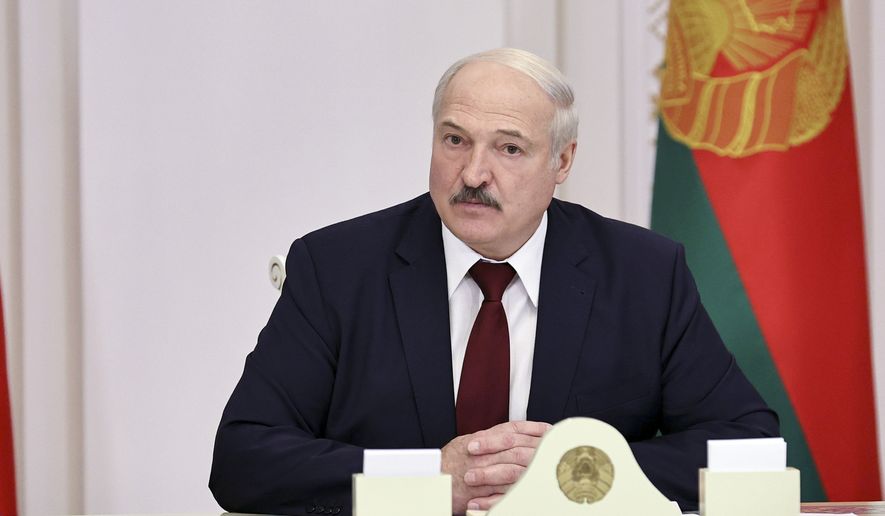 Belarusian President Alexander Lukashenko attends a meeting in Minsk, Belarus, Tuesday, Oct. 27, 2020. (Nikolai Petrov/BelTA Pool Photo via AP)
