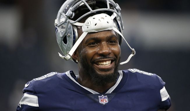 FILE - In this Nov. 23, 2017, file photo, Dallas Cowboys&#x27; Dez Bryant warms up before an NFL football game against the Los Angeles Chargers in Arlington, Texas. Former Cowboys receiver Dez Bryant is one step closer to playing in the NFL again. The 31-year-old Bryant signed with the Baltimore Ravens on Tuesday, Oct. 27, 2020 and has been assigned to the practice squad. (AP Photo/Ron Jenkins, File)