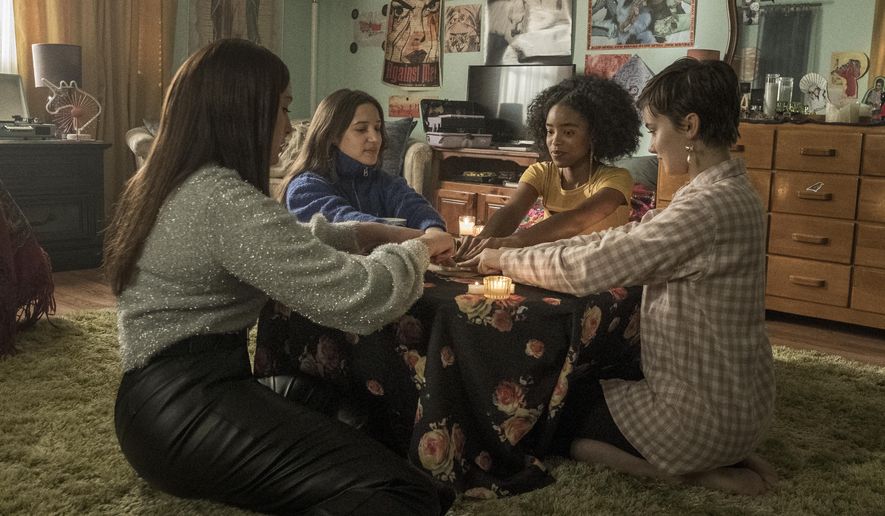 This image released by Sony Pictures shows, from left, Zoey Luna, Gideon Adlon, Lovie Simone and Cailee Spaeny in a scene from "The Craft: Legacy." (Columbia Pictures/Sony via AP)
