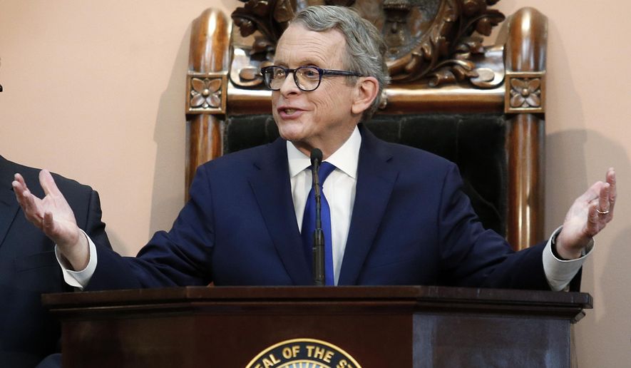 FILE - In this March 5, 2019, file photo, Ohio Gov. Mike DeWine speaks during the Ohio State of the State address at the Ohio Statehouse in Columbus, Ohio. Every Tuesday for months, DeWine interrupts his remarks on pandemic stats and safety measures and pleads with fellow Republican lawmakers to act on his legislation addressing gun violence in the state. DeWine proposed the bill after a mass shooting in Dayton in 2019. A key element is boosting penalties for felons committing new crimes with guns. The governor says the need has only grown more dire since Dayton. (AP Photo/Paul Vernon, File)