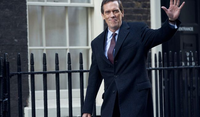 This image released by PBS shows Hugh Laurie as a heedless British politician beset by scandal in the four-episode series &amp;quot;Roadkill,&amp;quot; premiering on MASTERPIECE, Sunday, Nov. 1, 2020 on PBS.  (MASTERPIECE/PBS via AP)