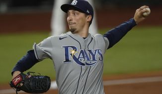 Tampa Bay Rays starting pitcher Blake Snell throws against the Los Angeles Dodgers during the first inning in Game 6 of the baseball World Series Tuesday, Oct. 27, 2020, in Arlington, Texas. (AP Photo/Eric Gay)