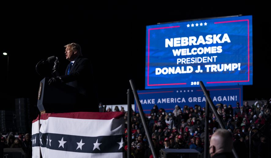 President Donald Trump speaks during a campaign rally at Eppley Airfield, Tuesday, Oct. 27, 2020, in Omaha, Neb. (AP Photo/Evan Vucci)