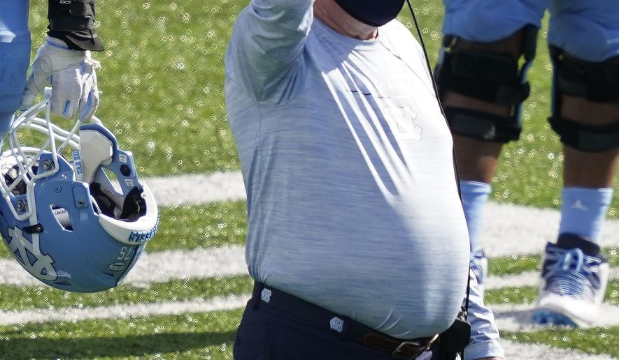North Carolina head coach Mack Brown is seen during the second half of an NCAA college football game against North Carolina State in Chapel Hill, N.C., Saturday, Oct. 24, 2020. (AP Photo/Gerry Broome)