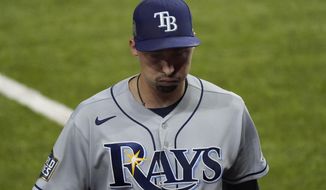 Tampa Bay Rays starting pitcher Blake Snell leaves the game against the Los Angeles Dodgers during the sixth inning in Game 6 of the baseball World Series Tuesday, Oct. 27, 2020, in Arlington, Texas. (AP Photo/Tony Gutierrez)