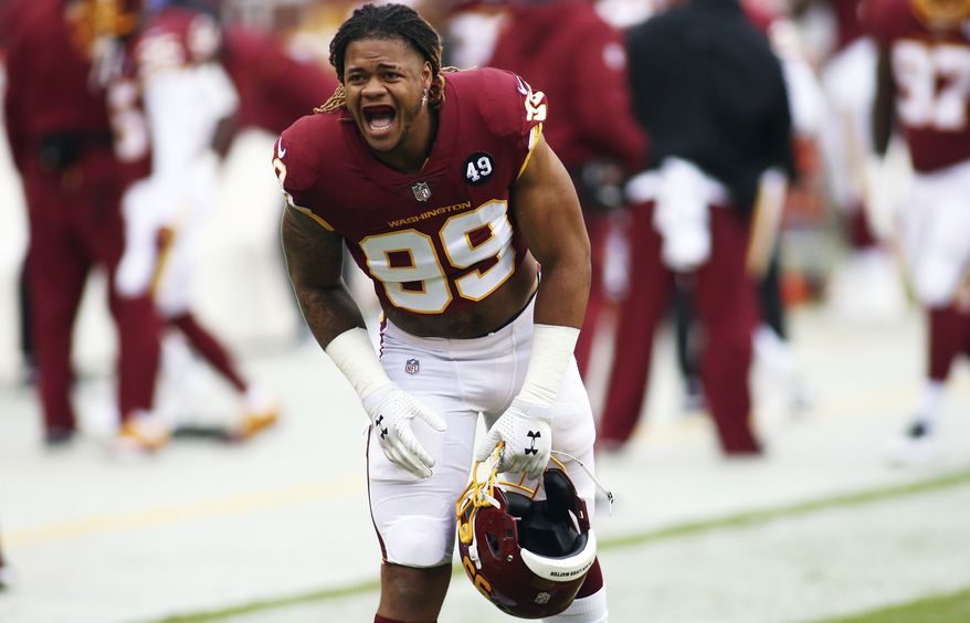 Washington Football Team defensive end Chase Young (99) in action during an NFL football game against the Dallas Cowboys, Sunday, Oct. 25, 2020 in Landover, Md. (AP Photo/Daniel Kucin Jr.)