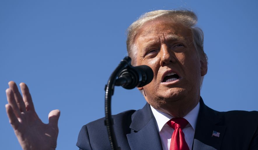 In this file photo, President Donald Trump speaks during a campaign rally at Laughlin/Bullhead International Airport, Wednesday, Oct. 28, 2020, in Bullhead City, Ariz. (AP Photo/Evan Vucci, File) **FILE**