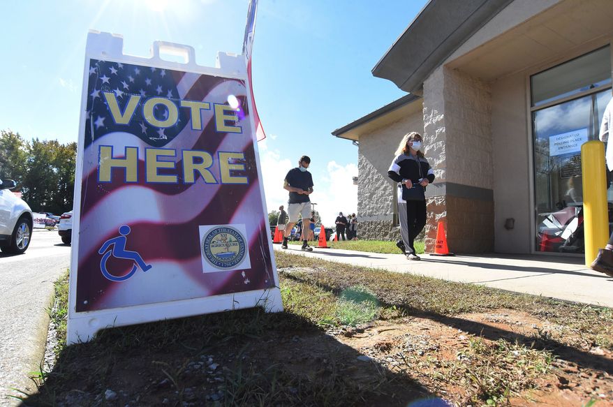 Voters wait in line to vote at the Hamilton County Election Commission, Thursday Oct. 29, 2020 on the final day for early voting in Chattanooga, Tenn. (Matt Hamilton /Chattanooga Times Free Press via AP)