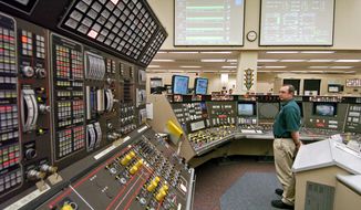 FILE – In this April 12, 2005, file photo, operator Kevin Holko monitors the control room during a scheduled refueling shutdown at the Perry Nuclear Power Plant in North Perry, Ohio. A federal court docket showed that &amp;quot;plea agreements&amp;quot; were filed Thursday, Oct. 29, 2020 for defendants Jeffrey Longstreth, a longtime political adviser, and Juan Cespedes, a lobbyist described by investigators as a &amp;quot;key middleman&amp;quot; in a $60 million bribery case also involving ex-Ohio House Speaker Larry Householder alleged to have helped prop up this aging nuclear power plant and the Davis-Besse Nuclear Power Station in Oak Harbor, Ohio. (AP Photo/Mark Duncan, File)
