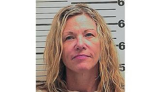 This file photo provided Friday, March 6, 2020, by the Madison County Sheriff&#39;s Office shows Lori Vallow, also known as Lori Daybell. An Idaho judge says Daybell and her husband Chad Daybell charged with conspiring to hide the bodies of her two missing children will stand trial together, rather than having two separate cases. Judge Steven Boyce also said Thursday, Oct. 29, 2020, that Chad and Lori Daybell&#39;s attorneys could ask to have the cases severed in the future if they feel their clients won&#39;t get fair treatment in a joint proceeding. (Madison County Sheriff&#39;s Office via AP, File)