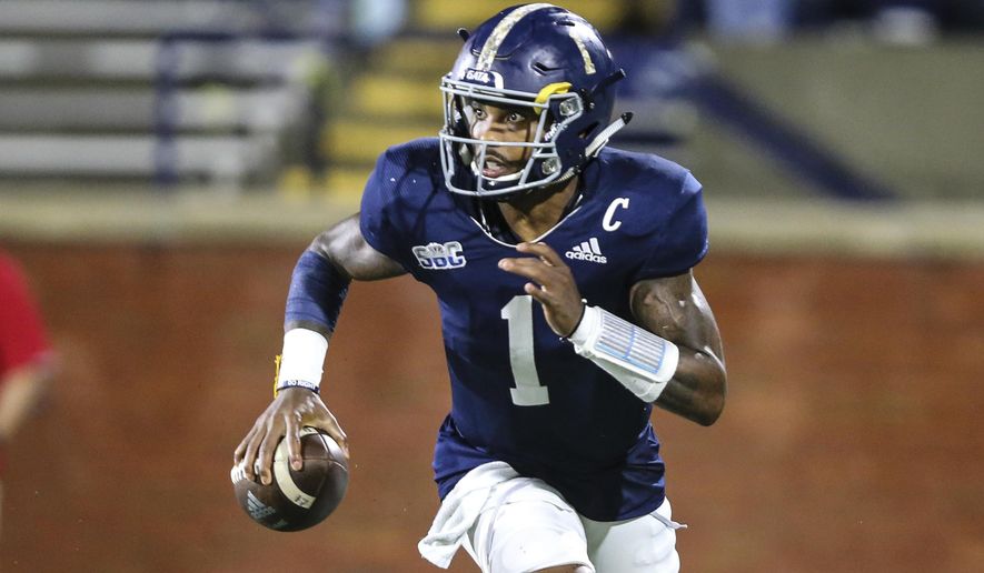 Georgia Southern quarterback Shai Werts (1) runs the ball during the first half of the team's NCAA college football game against South Alabama on Thursday, Oct. 29, 2020, in Statesboro, Ga. (AP Photo/Gary McCullough)