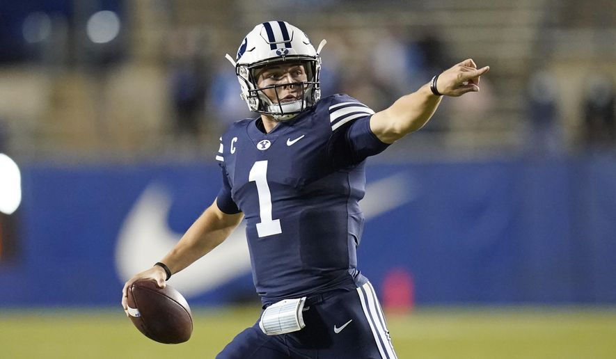 BYU quarterback Zach Wilson (1) looks down field in the first half during an NCAA college football game against Texas State Saturday, Oct. 24, 2020, in Provo, Utah. (AP Photo/Rick Bowmer)