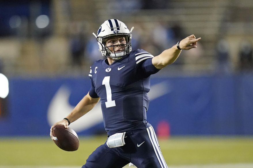 BYU quarterback Zach Wilson (1) looks down field in the first half during an NCAA college football game against Texas State Saturday, Oct. 24, 2020, in Provo, Utah. (AP Photo/Rick Bowmer)