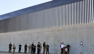 Acting Homeland Secretary Chad Wolf gives a speech in front of a new section of the border wall Thursday, Oct. 29, 2020, in McAllen, Texas. (Joel Martinez/The Monitor via AP) **FILE**