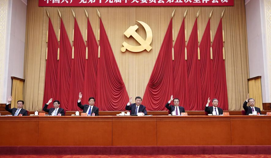 In this photo released by Xinhua News Agency, Chinese President Xi Jinping, also general secretary of the Communist Party of China (CPC) Central Committee, leads other Chinese leaders attending the fifth plenary session of the 19th Central Committee of the Communist Party of China (CPC) in Beijing, China on Oct. 29, 2020. China&#x27;s leaders are vowing to make their country a self-reliant &amp;quot;technology power&amp;quot; after a meeting to draft a development blueprint for the state-dominated economy over the next five years. (Wang Ye/Xinhua via AP)