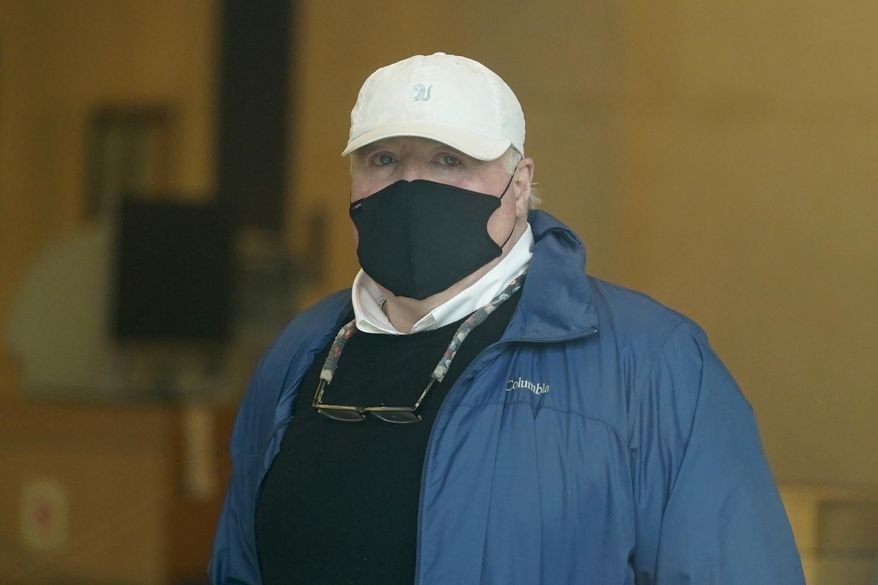 Michael Skakel arrives to a courthouse in Stamford, Conn., Friday, Oct. 30, 2020. Skakel, a Kennedy cousin, is expected at a court hearing as Connecticut prosecutors decide whether to retry him for the bludgeoning death of a fellow teenager in 1975. (AP Photo/Seth Wenig)