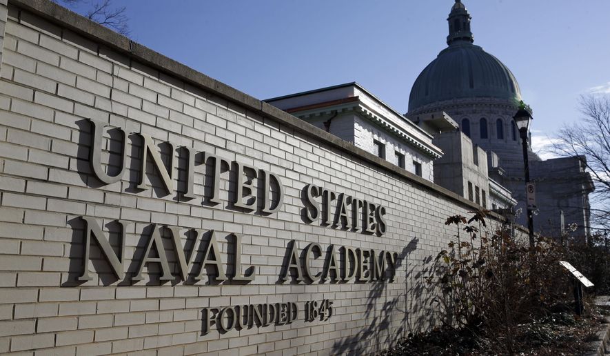 This Jan. 9, 2014 file photo shows a sign outside of an entrance to the U.S. Naval Academy campus in Annapolis, Md. (AP Photo/Patrick Semansky, File)
