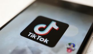 This Monday, Sept. 28, 2020, file photo, shows as  logo of a smartphone app TikTok on a user post on a smartphone screen in Tokyo. (AP Photo/Kiichiro Sato, File)  **FILE**