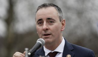In this Jan. 8, 2019, photo, Rep. Brian Fitzpatrick, R-Pa., speaks in Philadelphia during a demonstration against the partial government shutdown. (AP Photo/Matt Rourke) **FILE**