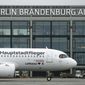 A &#39;Lufthansa&#39; ariplane is parked in front of Terminal 1 after its arrival at the new Berlin-Brandenburg-Airport &#39;Willy Brandt&#39; in Berlin, Germany, Saturday, Oct. 31, 2020. Berlin&#39;s new airport opens after years of delays and cost overruns. (AP Photo/Michael Sohn) **FILE**