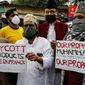 Muslim activists from various organizations participate in a  protest against France, near the French Consulate, in Kolkata, India, Saturday, Oct. 31, 2020. Muslims have been calling for both protests and a boycott of French goods in response to France&#39;s stance on caricatures of Islam&#39;s most revered prophet. (AP Photo/Bikas Das)