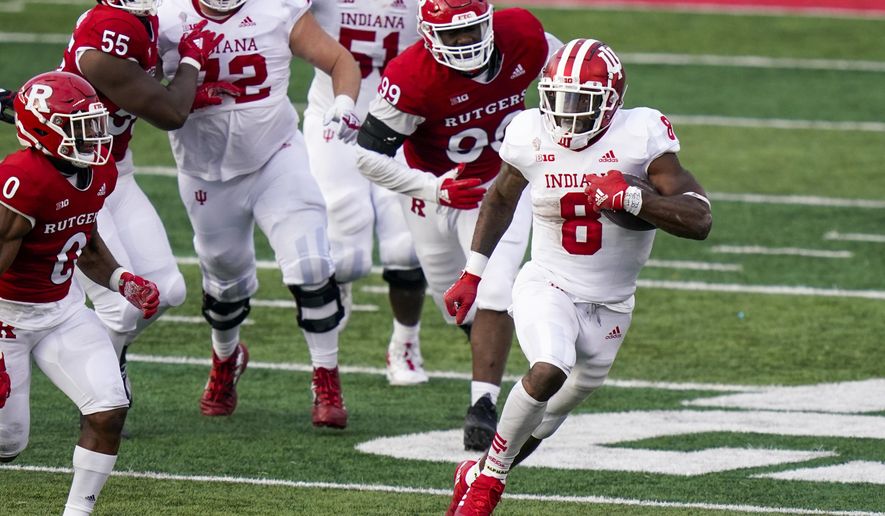 Indiana running back Stevie Scott III (8) carries during the second quarter of the team's NCAA college football game against Rutgers, Saturday, Oct. 31, 2020, in Piscataway, N.J. (AP Photo/Corey Sipkin)