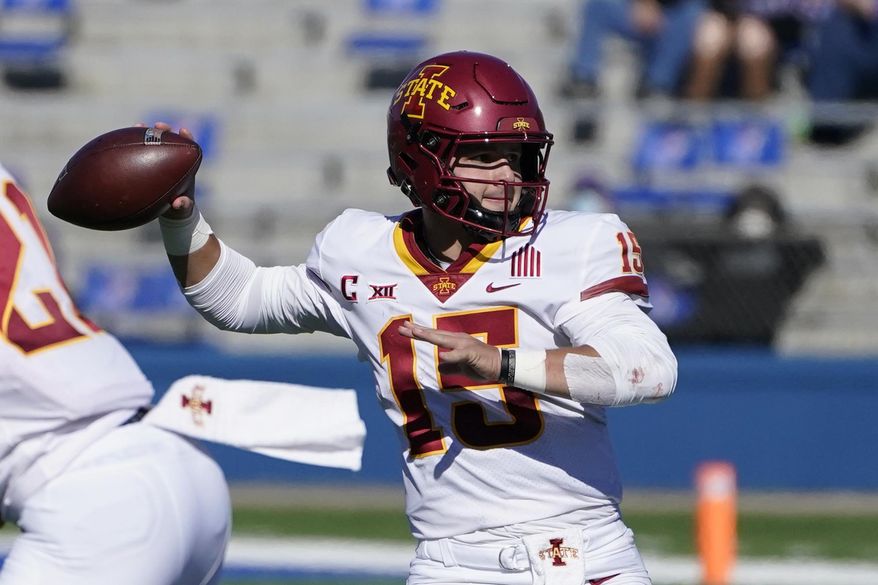 Iowa State quarterback Brock Purdy passes to a teammate during the second half of an NCAA college football game against Kansas in Lawrence, Kan., Saturday, Oct. 31, 2020. Iowa State defeated Kansas 52-22. (AP Photo/Orlin Wagner)
