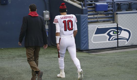 San Francisco 49ers quarterback Jimmy Garoppolo (10) walks to the locker room during the second half of an NFL football game against the Seattle Seahawks, Sunday, Nov. 1, 2020, in Seattle. (AP Photo/Scott Eklund)