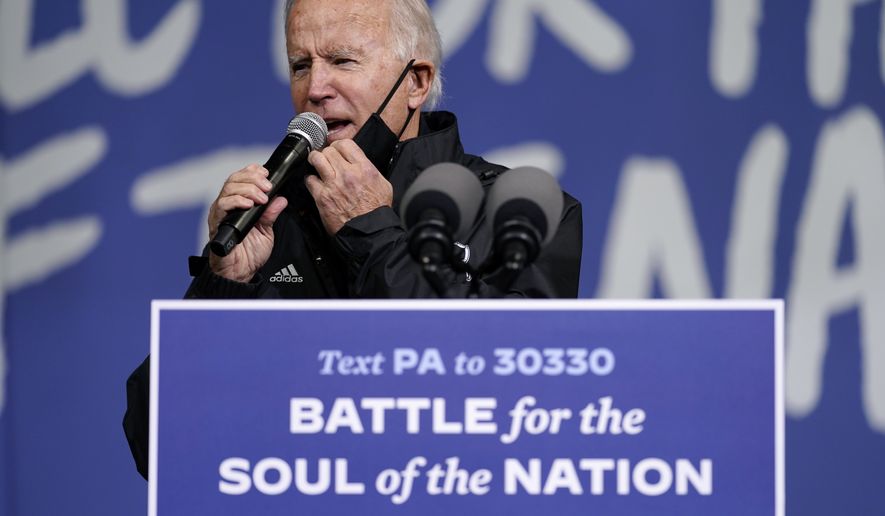 Democratic presidential candidate former Vice President Joe Biden arrives to speak at a &quot;Souls to the Polls&quot; drive-in rally at Sharon Baptist Church, Sunday, Nov. 1, 2020, in Philadelphia. (AP Photo/Andrew Harnik)