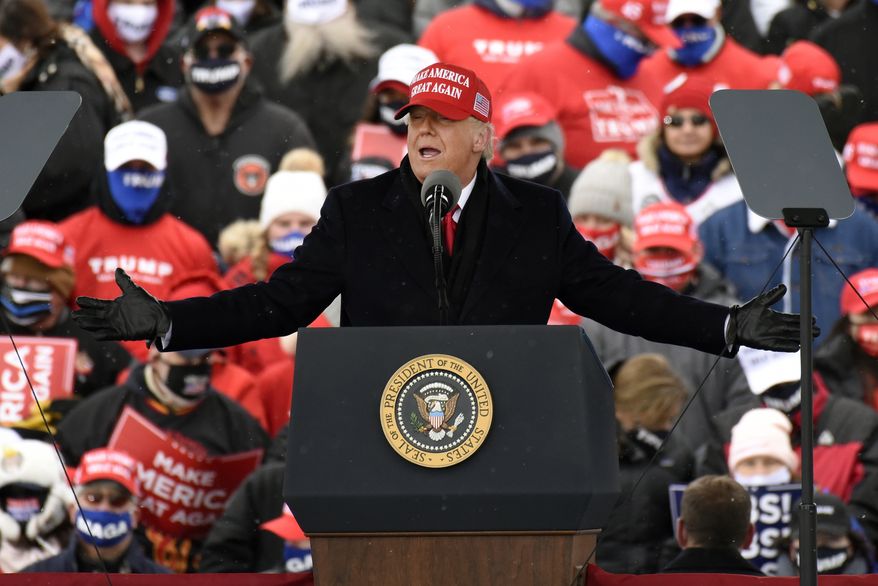 President Donald Trump speaks during a campaign rally at Michigan Sports Stars Park, Sunday, Nov. 1, 2020, in Washington, Mich. (AP Photo/Jose Juarez) ** FILE **