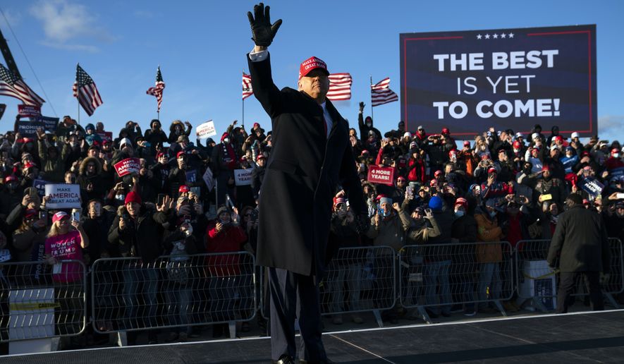 President Donald Trump walks off stage after speaking during a campaign rally at Wilkes-Barre Scranton International Airport, Monday, Nov. 2, 2020, in Avoca, Pa. (AP Photo/Evan Vucci)