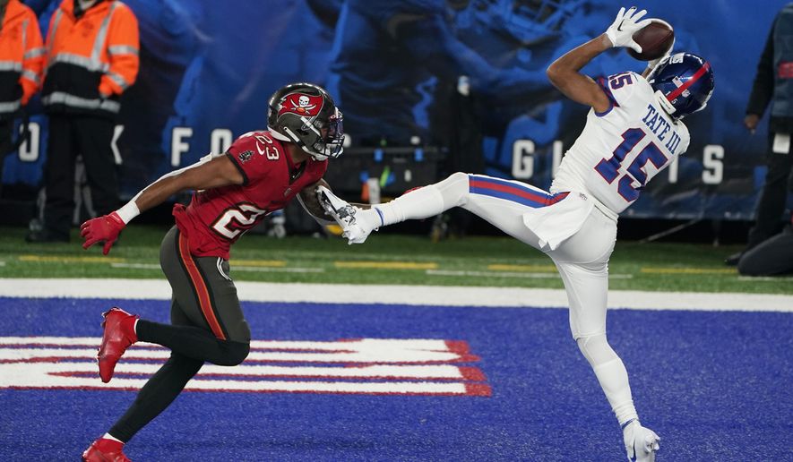 New York Giants' Golden Tate, right, catches a touchdown in front of Tampa Bay Buccaneers' Sean Murphy-Bunting during the second half of an NFL football game, Monday, Nov. 2, 2020, in East Rutherford, N.J. (AP Photo/Corey Sipkin)