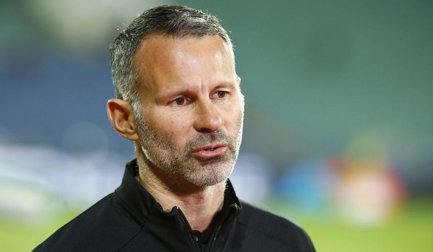 Wales coach Ryan Giggs talks to media prior to the UEFA Nations League soccer match between Bulgaria and Wales at Vassil Levski national stadium in Sofia, Bulgaria, Wednesday, Oct. 14, 2020. (AP Photo/Anton Uzunov)