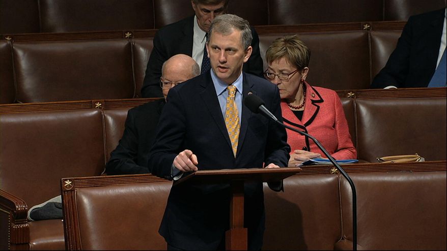 In this Dec. 18, 2019, file photo, Rep. Sean Casten, D-Ill., speaks on the House floor as the House of Representatives debates the articles of impeachment against President Donald Trump at the Capitol in Washington, Wednesday, Dec. 18, 2019. (House Television via AP, File)