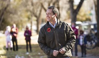 Gov. Steve Bullock speaks at a Democratic Party &amp;quot;Get Out The Vote&amp;quot; rally on Saturday, Oct. 31, 2020, in Bozeman, Mt. (Rachel Leather/Bozeman Daily Chronicle via AP)