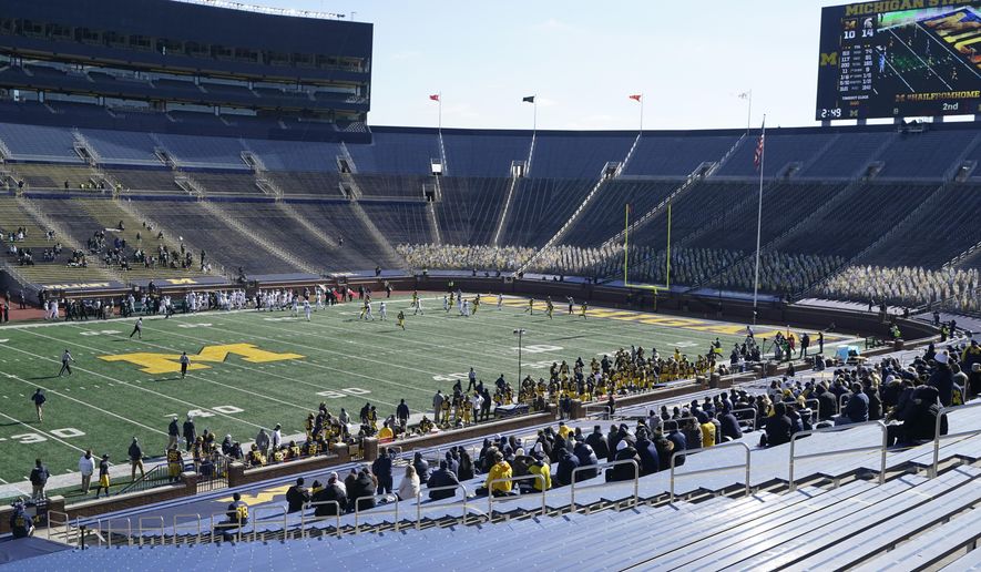 Michigan and Michigan State play during the first half of an NCAA college football game, Saturday, Oct. 31, 2020, in Ann Arbor, Mich. (AP Photo/Carlos Osorio)