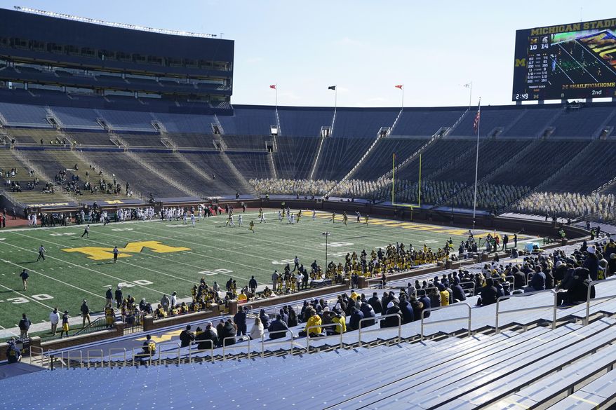Michigan and Michigan State play during the first half of an NCAA college football game, Saturday, Oct. 31, 2020, in Ann Arbor, Mich. (AP Photo/Carlos Osorio)