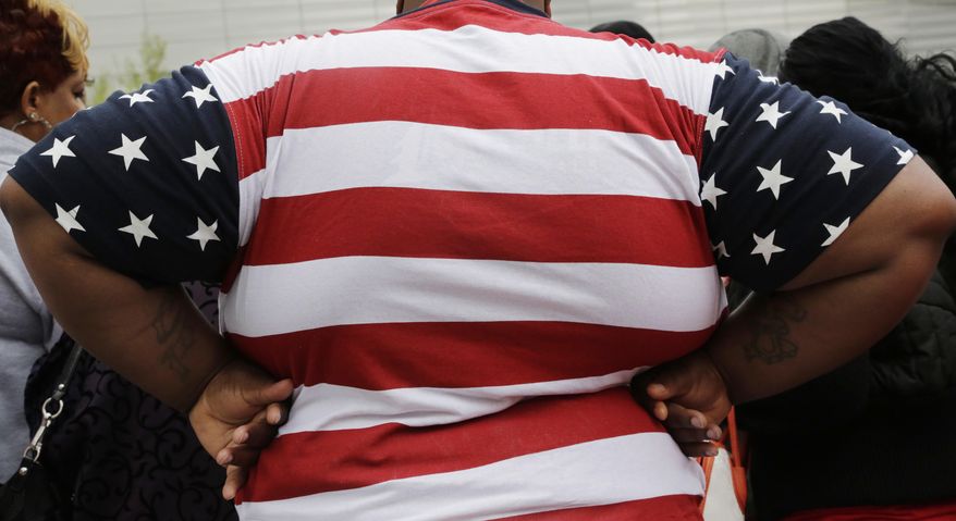 In this May 8, 2014, photo, an overweight person is seen in New York. (AP Photo/Mark Lennihan) **FILE**