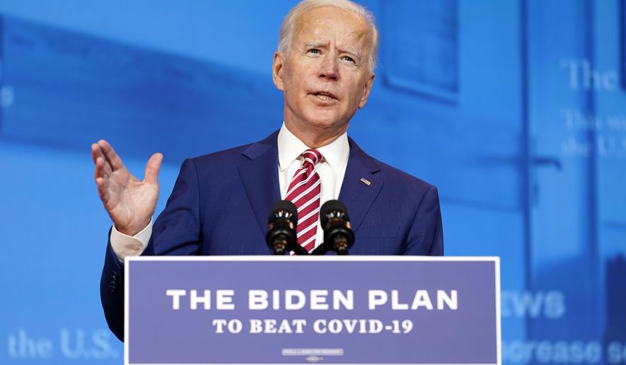FILE - In this Friday, Oct. 23, 2020 file photo, Democratic presidential candidate former Vice President Joe Biden speaks about coronavirus at The Queen theater in Wilmington, Del. Delaware residents have their first opportunity in the four-decade political career of home-state favorite Joe Biden to vote for him as a presidential candidate in a general election. Tuesday's balloting also includes Republican challenges to two of the three members of Delaware's all-Democrat congressional delegation and to incumbent Democratic Gov. John Carney. (AP Photo/Andrew Harnik, File)