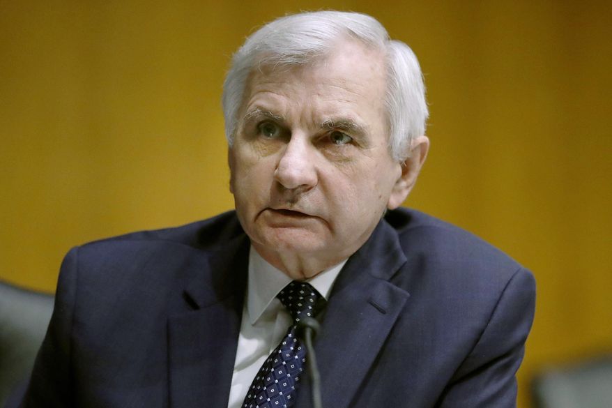 In this May 5, 2020, photo, Sen. Jack Reed, D-R.I., listens during a Senate Intelligence Committee nomination hearing on Capitol Hill in Washington. (AP Photo/Andrew Harnik, Pool) **FILE**