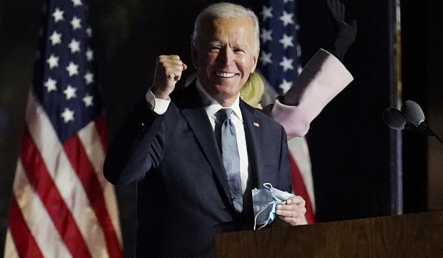 Democratic presidential candidate former Vice President Joe Biden speaks to supporters, early Wednesday, Nov. 4, 2020, in Wilmington, Del. (AP Photo/Paul Sancya