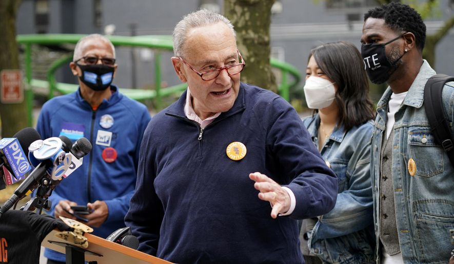 Sen. Chuck Schumer speaks at a news conference outside an early voting site in New York, Tuesday, Oct. 27, 2020. New Yorkers lined up to vote early for a fourth consecutive day Tuesday after a weekend that saw a crush of more than 400,000 voters statewide. The unofficial tally shows about 194,000 voters this weekend in New York City, where some people waited an hour or more in lines that stretched for several blocks. (AP Photo/Seth Wenig) ** FILE **
