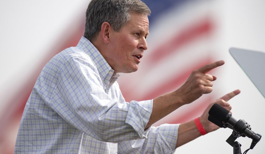 FILE - In this Sept. 14, 2020, file photo, Sen. Steve Daines, R-Mont., speaks at a campaign rally for his reelection bid in Belgrade, Mont. (AP Photo/Tommy Martino, File)