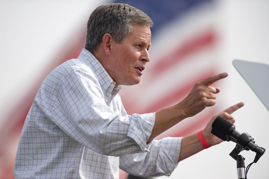FILE - In this Sept. 14, 2020, file photo, Sen. Steve Daines, R-Mont., speaks at a campaign rally for his reelection bid in Belgrade, Mont. (AP Photo/Tommy Martino, File)