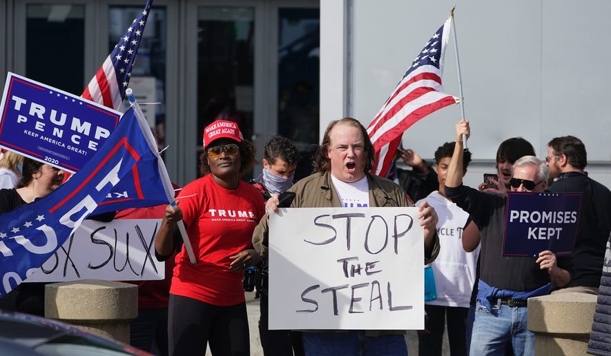 Supporters of President Trump demonstrate in Atlanta — hoping to &quot;stop the steal&quot; of the presidential election due to possible voter fraud. (Associated Press)