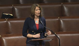 Rep. Cheri Bustos, D-Ill., speaks on the floor of the House of Representatives at the U.S. Capitol in Washington. (House Television via AP, File)
