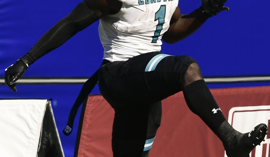 Coastal Carolina running back CJ Marable celebrates a long gain against Georgia State during the second half of an NCAA football game Saturday, Oct. 31, 2020, in Atlanta. Coastal Carolina won 51-0. (AP Photo/John Amis)